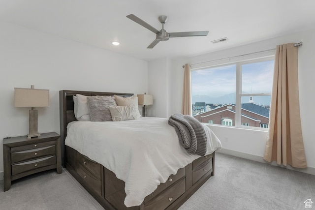 bedroom with visible vents, baseboards, recessed lighting, a ceiling fan, and light colored carpet