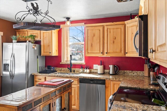 3824 S 500 E, South Salt Lake, UT 84106 - kitchen featuring a sink, light brown cabinets, appliances with stainless steel finishes, and a kitchen island