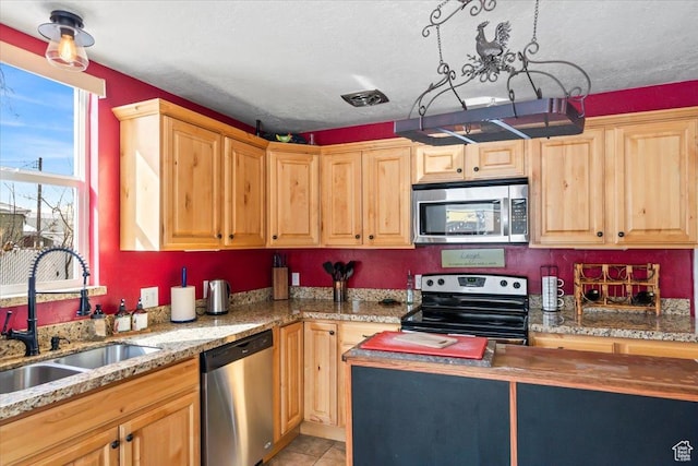 3824 S 500 E, South Salt Lake, UT 84106 - kitchen with a sink, light brown cabinets, appliances with stainless steel finishes, and light stone countertops