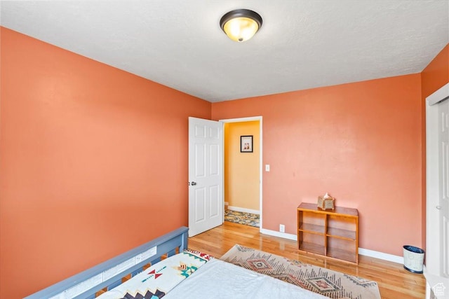 3824 S 500 E, South Salt Lake, UT 84106 - bedroom with light wood-style flooring and baseboards