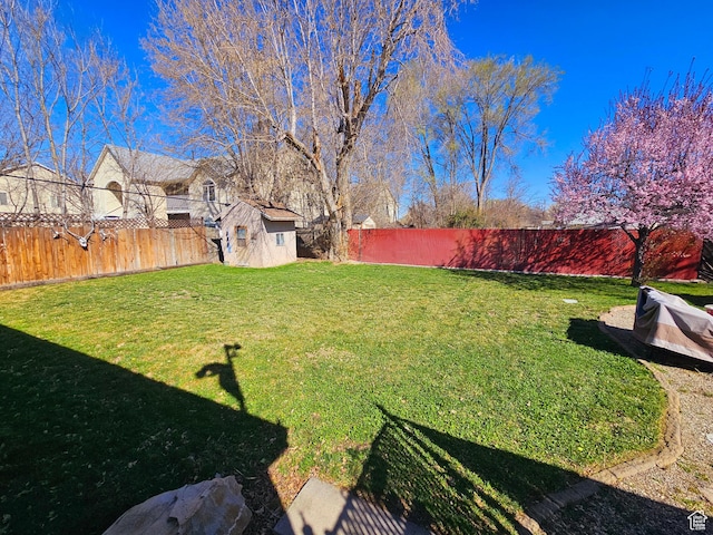 3824 S 500 E, South Salt Lake, UT 84106 - view of yard with an outbuilding, a fenced backyard, and a shed