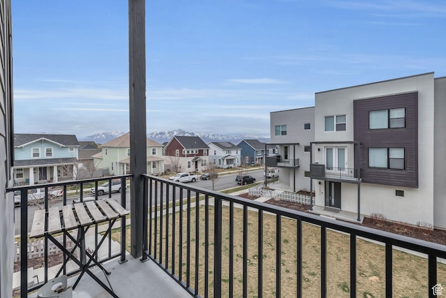balcony featuring a residential view