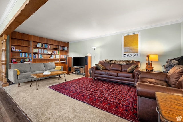 living room featuring ornamental molding and wood finished floors