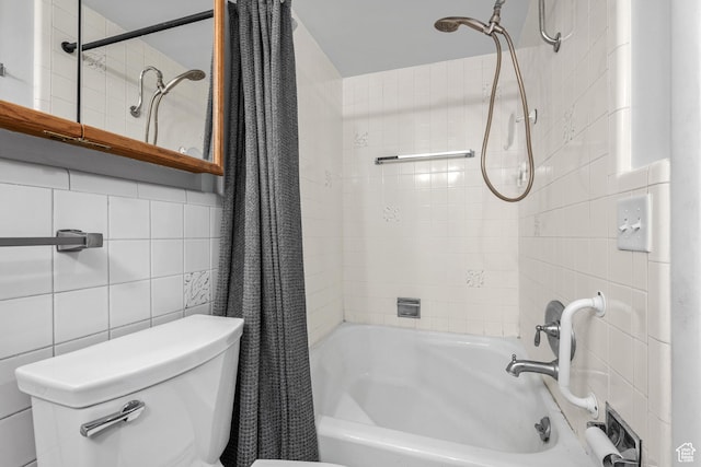 bathroom with backsplash, toilet, tile walls, and shower / tub combo