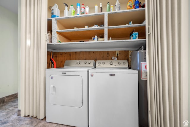 laundry area featuring separate washer and dryer and laundry area