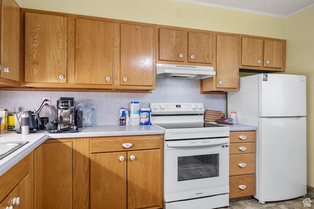 kitchen with light countertops, crown molding, white appliances, under cabinet range hood, and brown cabinetry