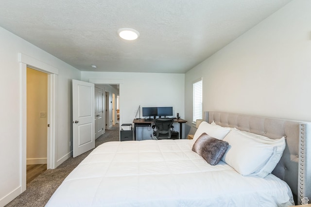 917 W 1000 N Unit 6, Tremonton, UT 84337 - bedroom with baseboards, carpet floors, and a textured ceiling