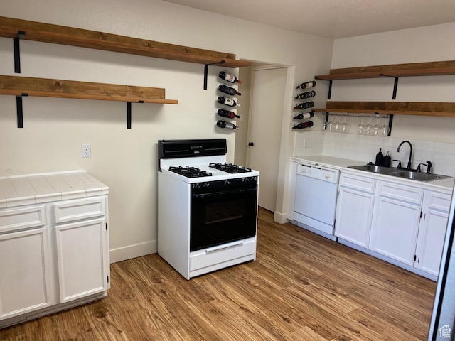 369 E 400 S, Springville, UT 84663 - kitchen with open shelves, gas stove, a sink, tile countertops, and dishwasher