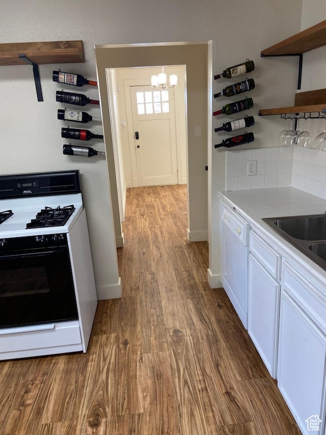 369 E 400 S, Springville, UT 84663 - kitchen featuring a notable chandelier, open shelves, dishwasher, gas stove, and dark wood-style flooring