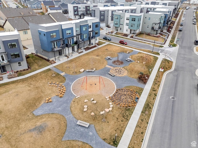 birds eye view of property with a residential view