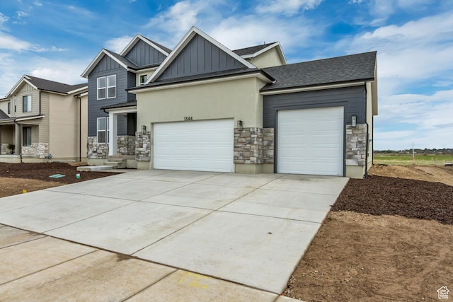 1344 N 1525 E Unit 73, Payson, UT 84651 - craftsman-style house with a garage, board and batten siding, stone siding, and concrete driveway