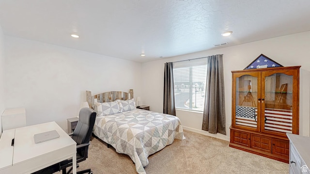 1410 S Divide Dr Unit 144, Santaquin, UT 84655 - bedroom featuring light carpet, baseboards, visible vents, and recessed lighting
