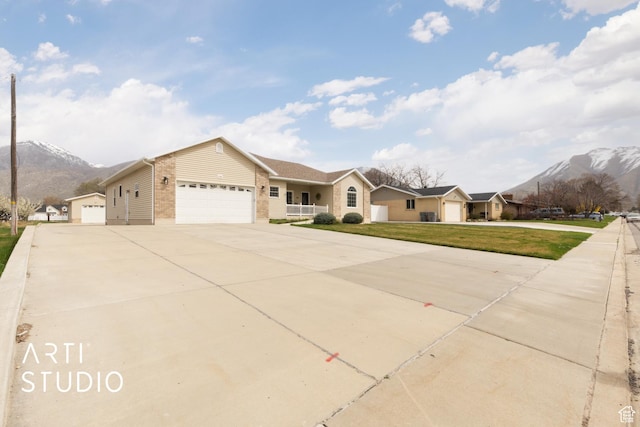 486 W 1200 N, Mapleton, UT 84664 - ranch-style house featuring an attached garage, a mountain view, a front lawn, and concrete driveway