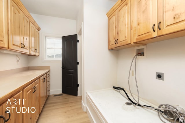 486 W 1200 N, Mapleton, UT 84664 - clothes washing area featuring washer hookup, baseboards, hookup for an electric dryer, light wood-style floors, and cabinet space
