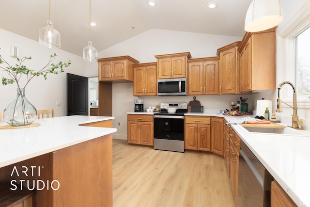 486 W 1200 N, Mapleton, UT 84664 - kitchen with a sink, stainless steel appliances, light wood-style floors, and pendant lighting