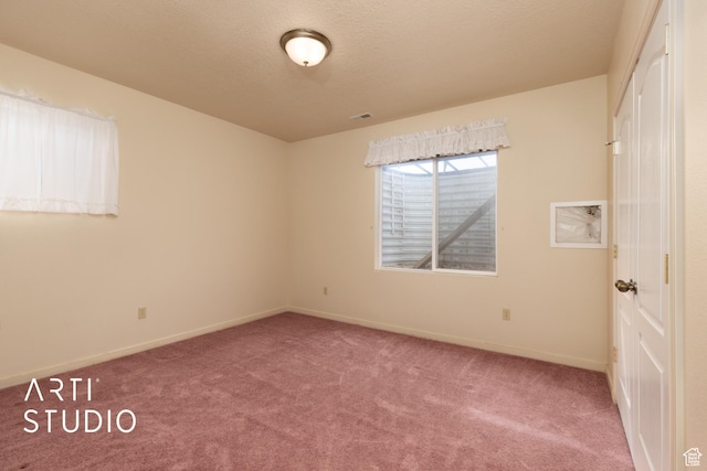 486 W 1200 N, Mapleton, UT 84664 - unfurnished room with baseboards, carpet flooring, a textured ceiling, and visible vents