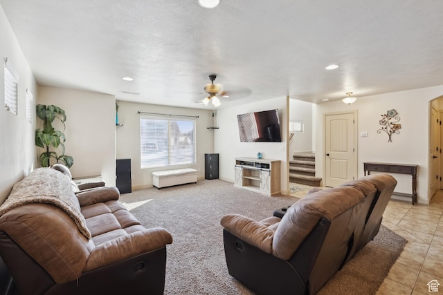 6212 W 100 S, Hurricane, UT 84737 - living area featuring stairs, a ceiling fan, light carpet, light tile patterned floors, and baseboards