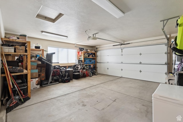 6212 W 100 S, Hurricane, UT 84737 - garage with fridge and a garage door opener