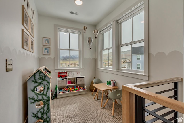 playroom with visible vents and carpet
