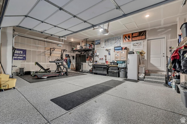 garage featuring a garage door opener