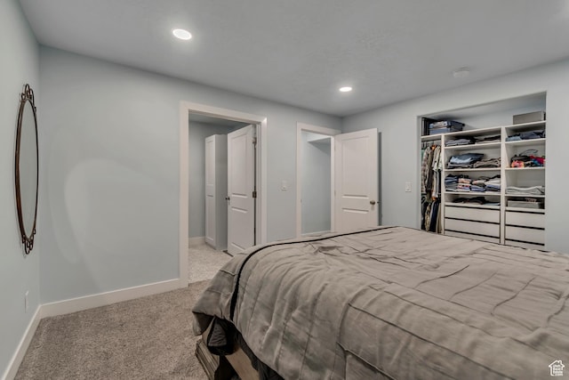 bedroom with carpet floors, baseboards, and recessed lighting