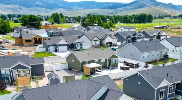 bird's eye view with a residential view and a mountain view