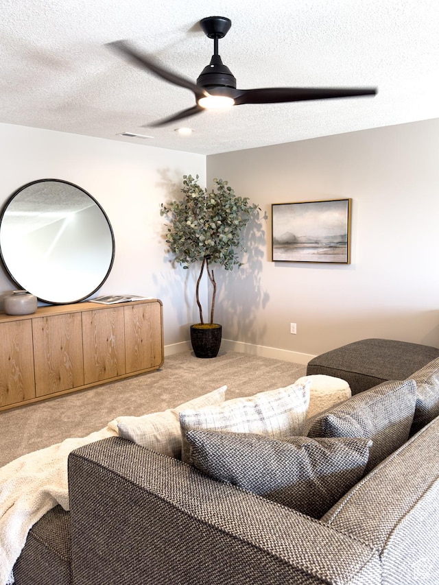 4436 W 1050 S Unit 104, West Point, UT 84015 - living room with baseboards, carpet floors, a textured ceiling, and ceiling fan
