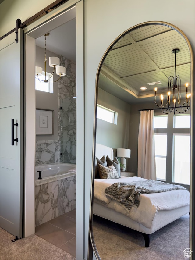 4436 W 1050 S Unit 104, West Point, UT 84015 - carpeted bedroom featuring tile patterned floors, a barn door, and a chandelier