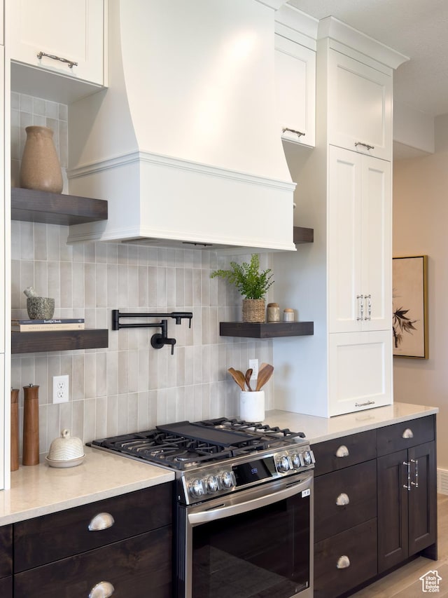 4436 W 1050 S Unit 104, West Point, UT 84015 - kitchen with light countertops, gas stove, white cabinets, and open shelves