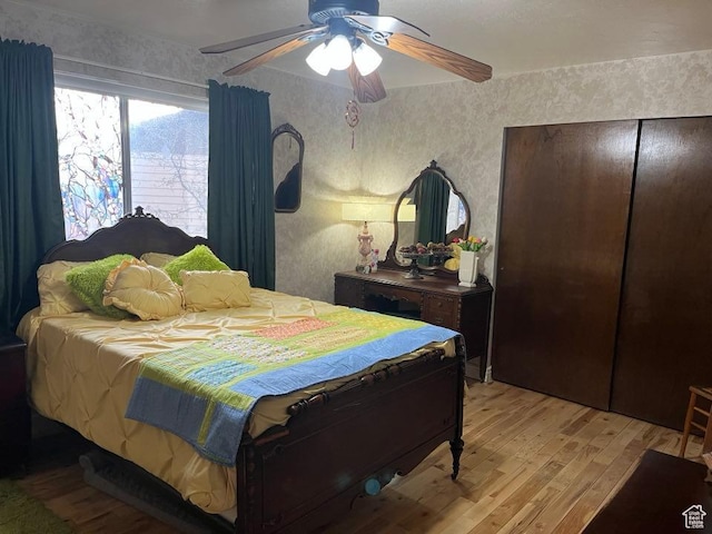 1213 N Winston Dr, Kaysville, UT 84037 - bedroom with light wood finished floors and ceiling fan