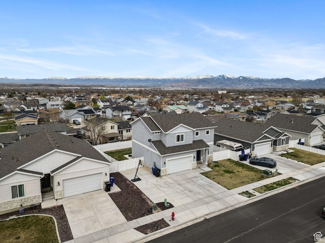 7756 W Bellfield Rd, Magna, UT 84044 - drone / aerial view with a residential view and a mountain view