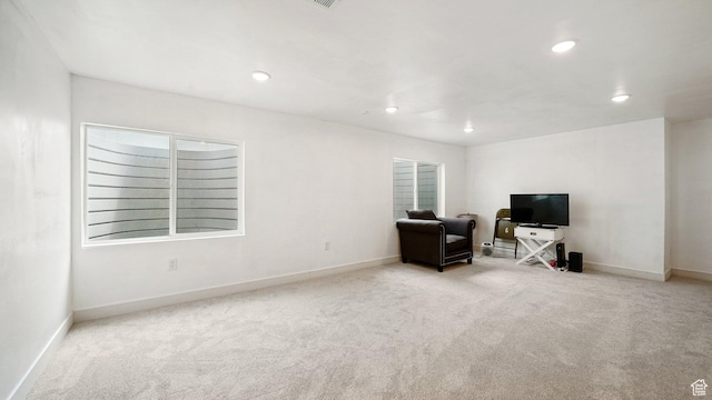7756 W Bellfield Rd, Magna, UT 84044 - living area featuring baseboards, carpet floors, and recessed lighting