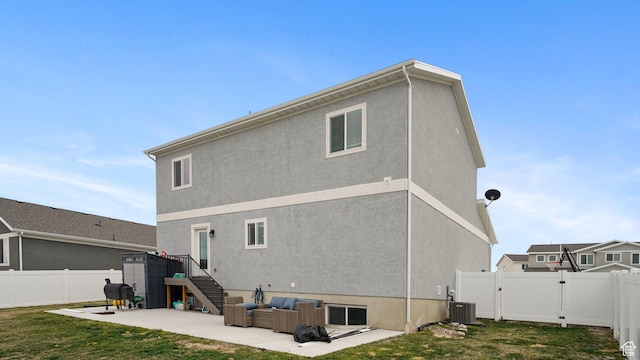 7756 W Bellfield Rd, Magna, UT 84044 - back of property with a fenced backyard, stairs, a gate, and a patio area
