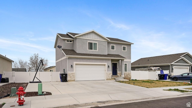 7756 W Bellfield Rd, Magna, UT 84044 - view of front of property with driveway, a gate, stucco siding, fence, and a garage