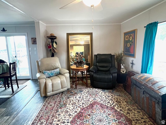 3203 S Nina Loop, Garden City, UT 84028 - living room with wood finished floors, ornamental molding, and a ceiling fan