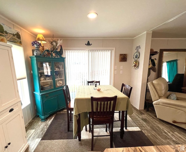 3203 S Nina Loop, Garden City, UT 84028 - dining area featuring ornamental molding and dark wood finished floors
