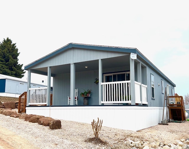 3203 S Nina Loop, Garden City, UT 84028 - manufactured / mobile home featuring a porch