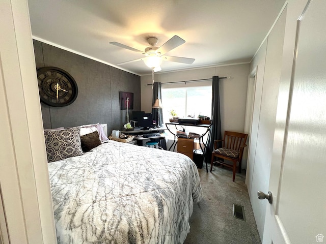 3203 S Nina Loop, Garden City, UT 84028 - bedroom with a ceiling fan, ornamental molding, carpet, and visible vents