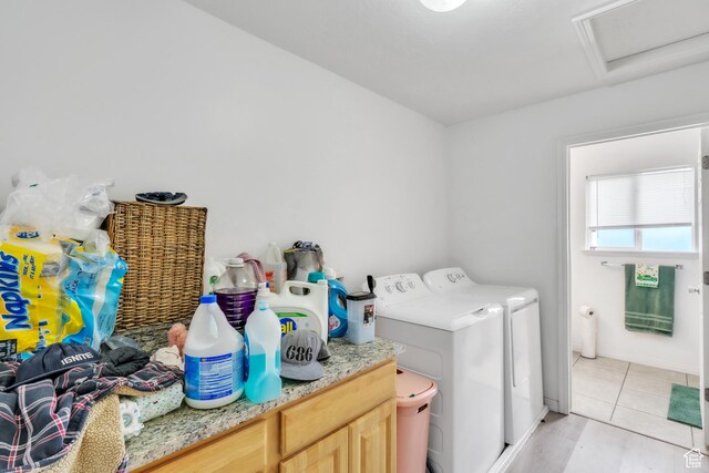 3127 W 525 N, West Point, UT 84015 - laundry room with light tile patterned floors, cabinet space, separate washer and dryer, and attic access