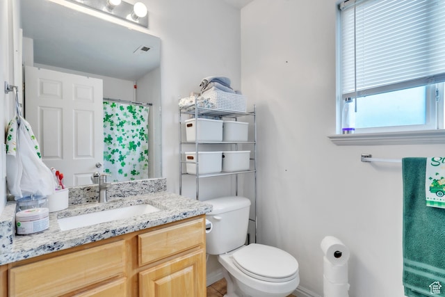 3127 W 525 N, West Point, UT 84015 - full bathroom with toilet, curtained shower, vanity, baseboards, and visible vents
