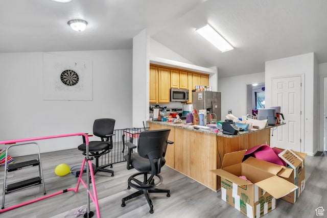 3127 W 525 N, West Point, UT 84015 - kitchen with a peninsula, light wood-type flooring, lofted ceiling, light brown cabinets, and stainless steel appliances