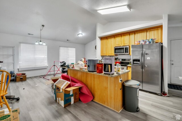 3127 W 525 N, West Point, UT 84015 - kitchen with lofted ceiling, light wood-style flooring, appliances with stainless steel finishes, and an inviting chandelier