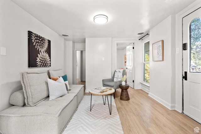 655 S 800 E, Salt Lake City, UT 84102 - living area featuring baseboards, visible vents, and light wood-type flooring