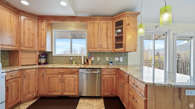 2484 Oakridge Dr, Spanish Fork, UT 84660 - kitchen with a peninsula, dishwasher, glass insert cabinets, a sink, and light stone counters