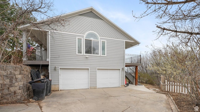 2484 Oakridge Dr, Spanish Fork, UT 84660 - view of property exterior with driveway, stairway, fence, and an attached garage