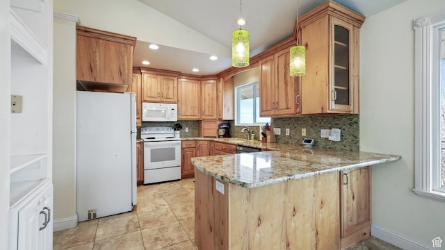 2484 Oakridge Dr, Spanish Fork, UT 84660 - kitchen featuring lofted ceiling, white appliances, backsplash, a sink, and a peninsula