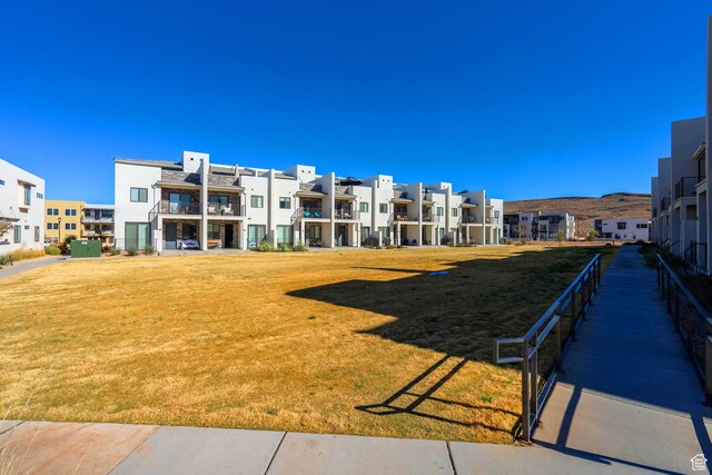 5399 S Cerulean Ln Unit 95, St George, UT 84790 - surrounding community with a residential view and a lawn