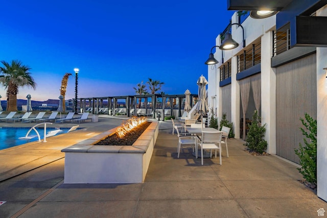 5399 S Cerulean Ln Unit 95, St George, UT 84790 - view of patio terrace at dusk