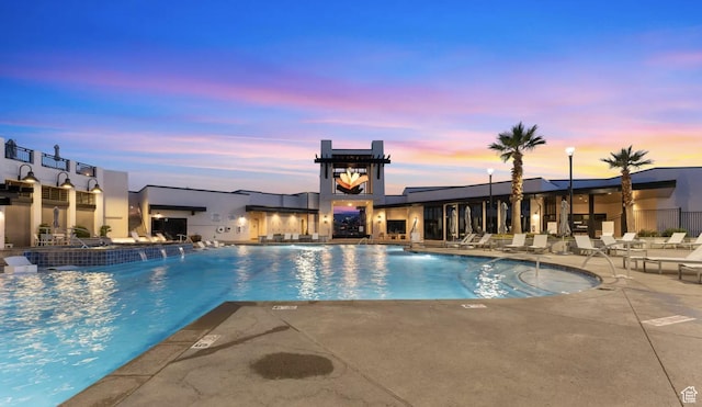 5399 S Cerulean Ln Unit 95, St George, UT 84790 - pool at dusk with a community pool and a patio area