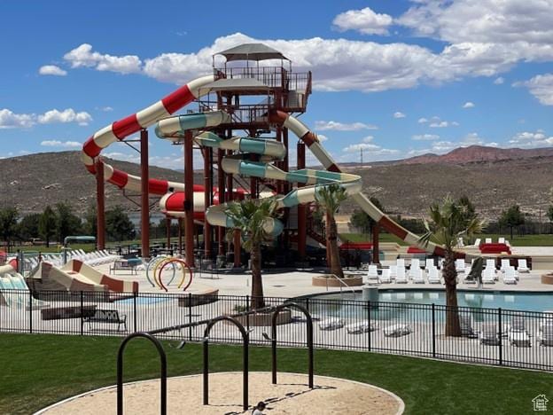 5399 S Cerulean Ln Unit 95, St George, UT 84790 - community play area with fence and a mountain view